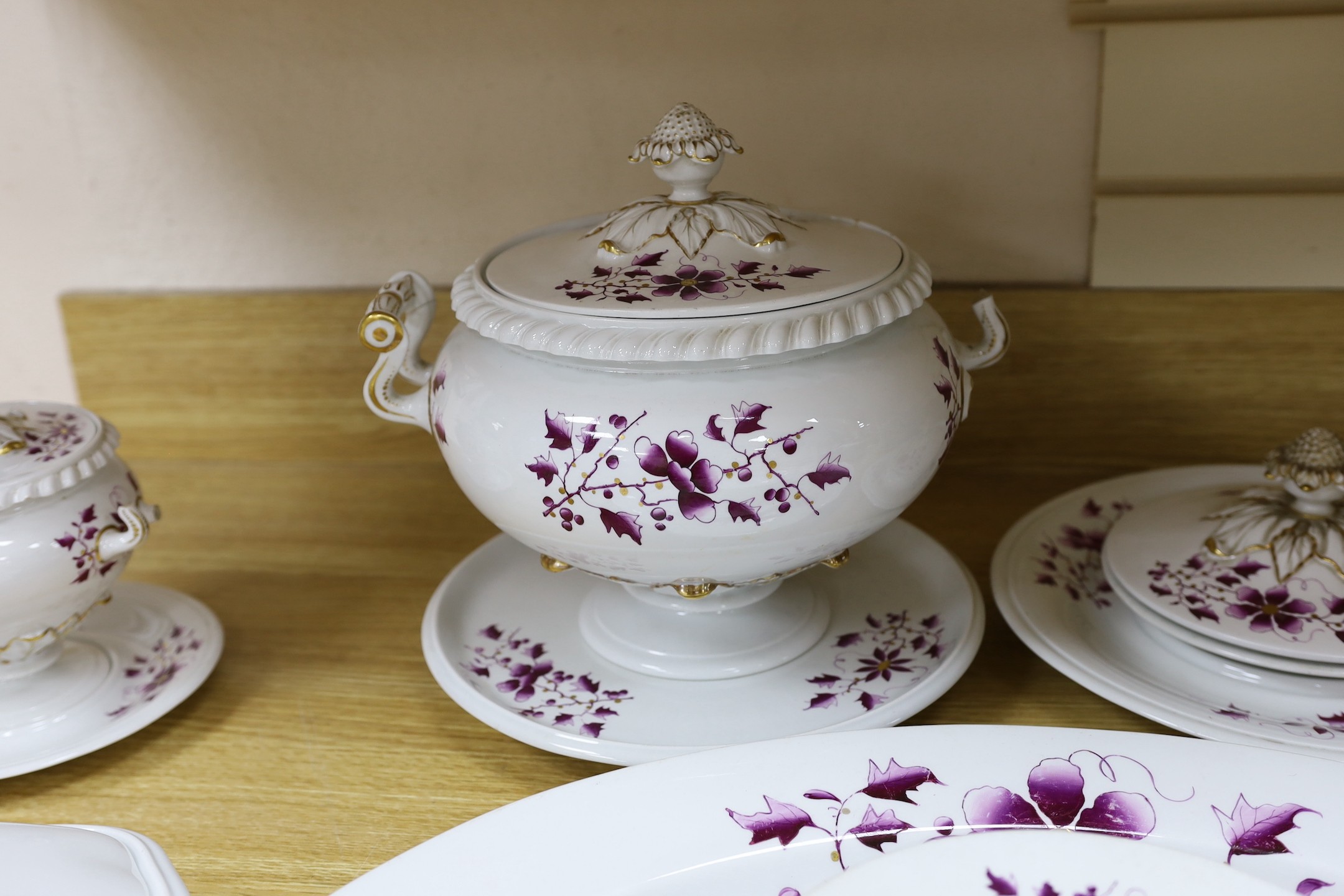 A Flight Barr and Barr floral and gilt decorated part dinner service